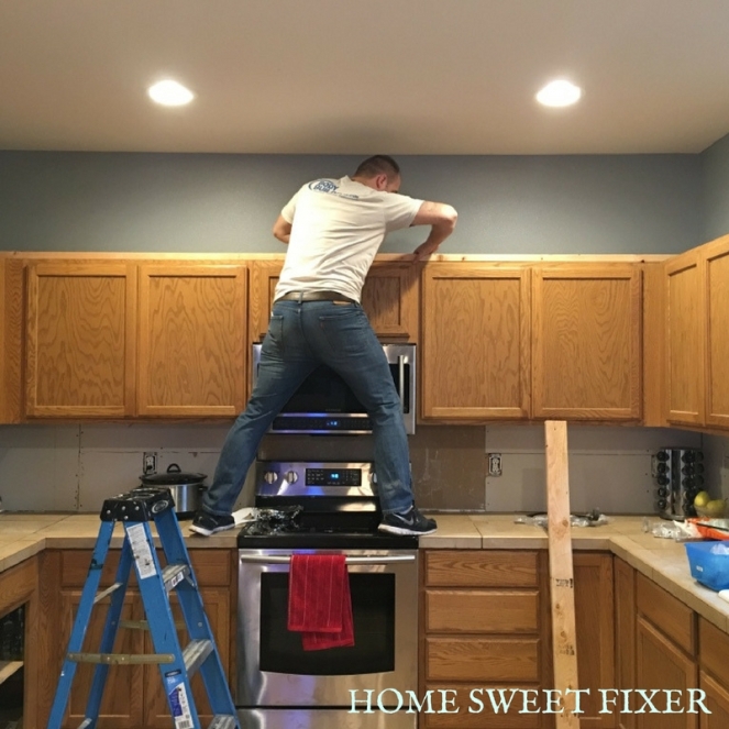 Add 2x4 supports to extend kitchen cabinets to ceiling-HOME SWEET FIXER.jpg