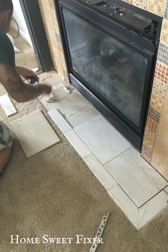 Laying New DIY Marble Tile Fireplace Surround-Home Sweet Fixer
